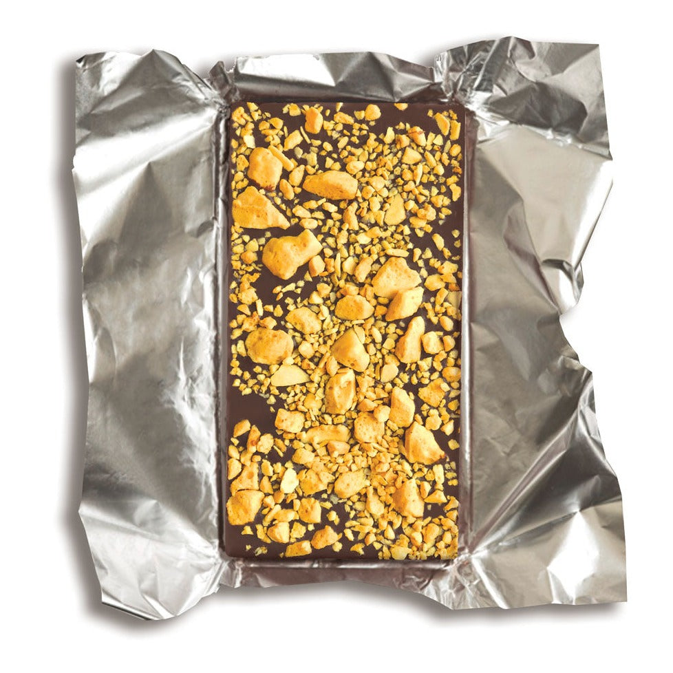 Dirty Cow Honey Come Home vegan chocolate. Honeycomb loaded onto milky vegan chocolate