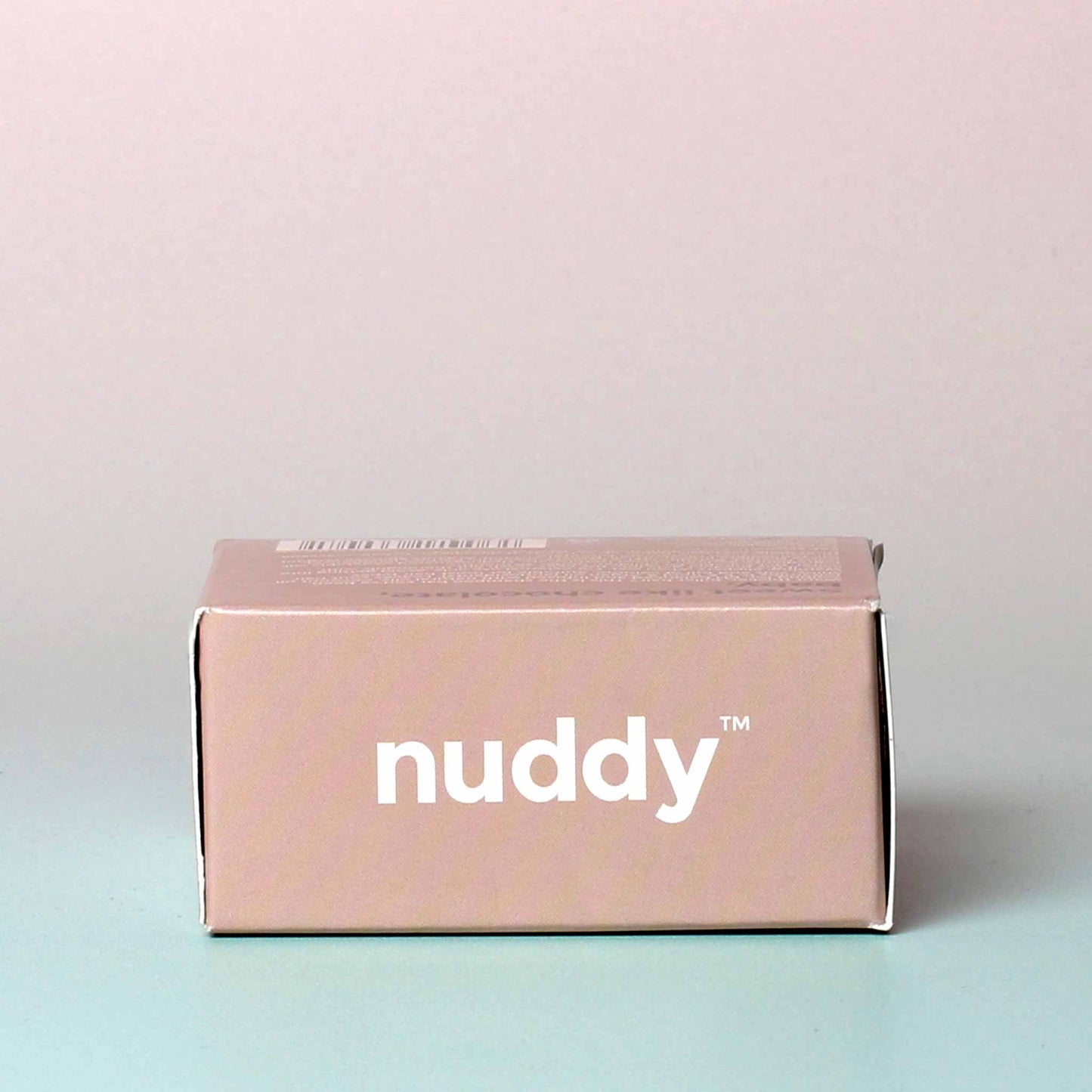 
                  
                    Nuddy Extra Thickening Shampoo Bar - Cocoa & Cardamom Logo Side
                  
                
