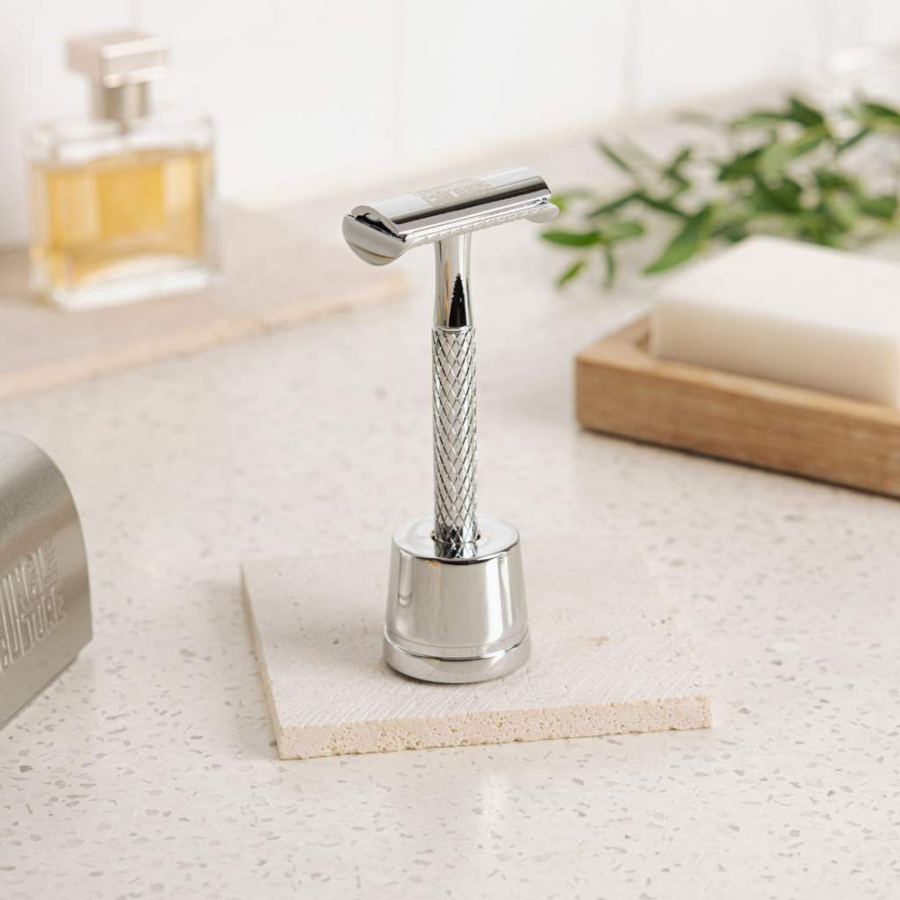 
                  
                    jungle culture eco reusable razor on stand in classic silver eco
                  
                