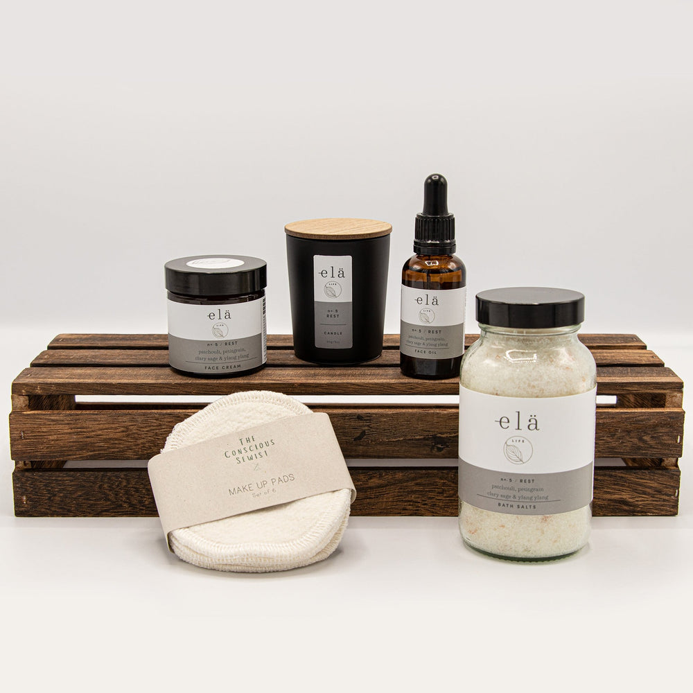Luxury Vegan Self Care Gift Box with bath salts, face cream, face oil and a candle. It will have you feeling relaxed and revived